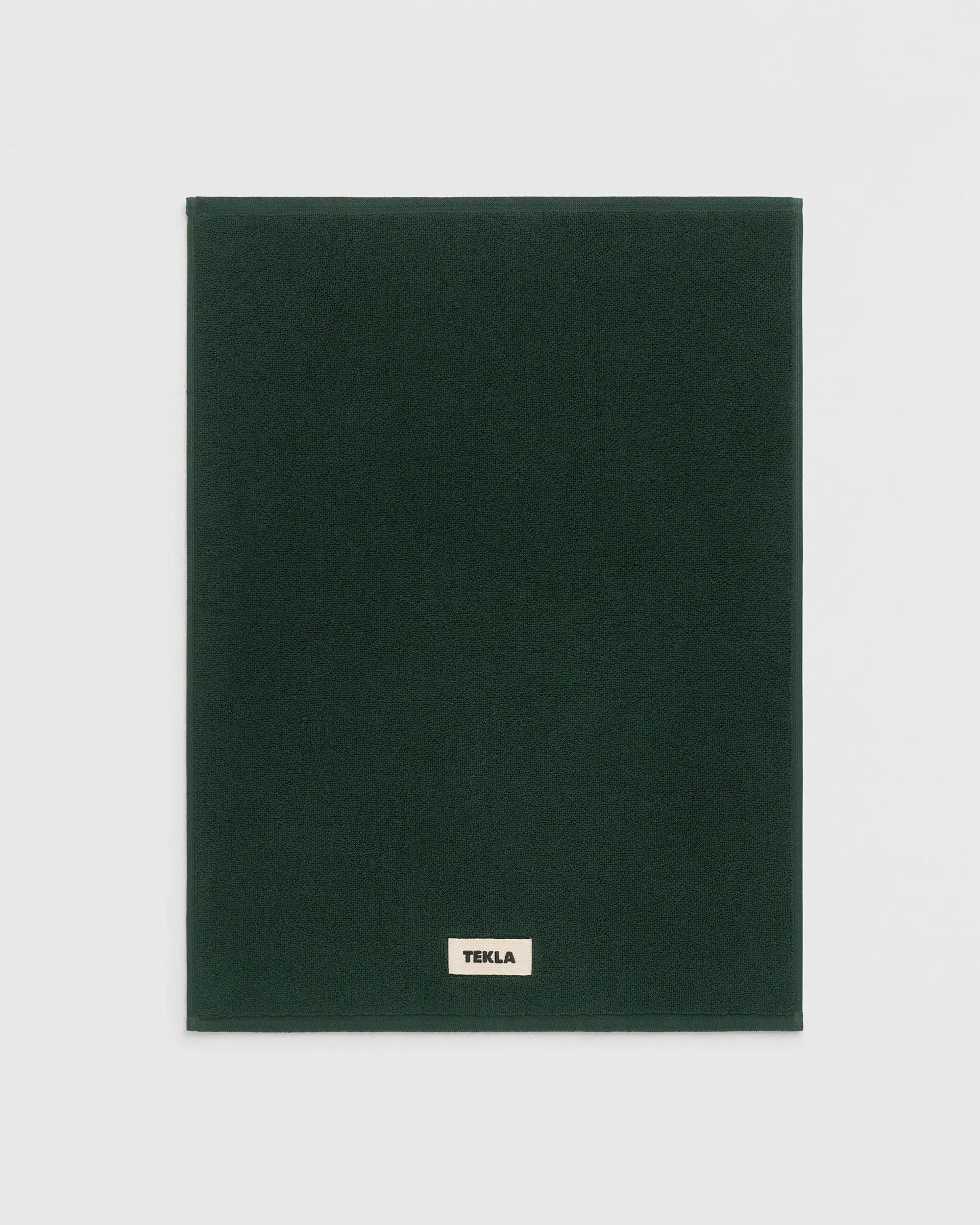 Tekla Fabrics Bath mat – solid – Forest Green