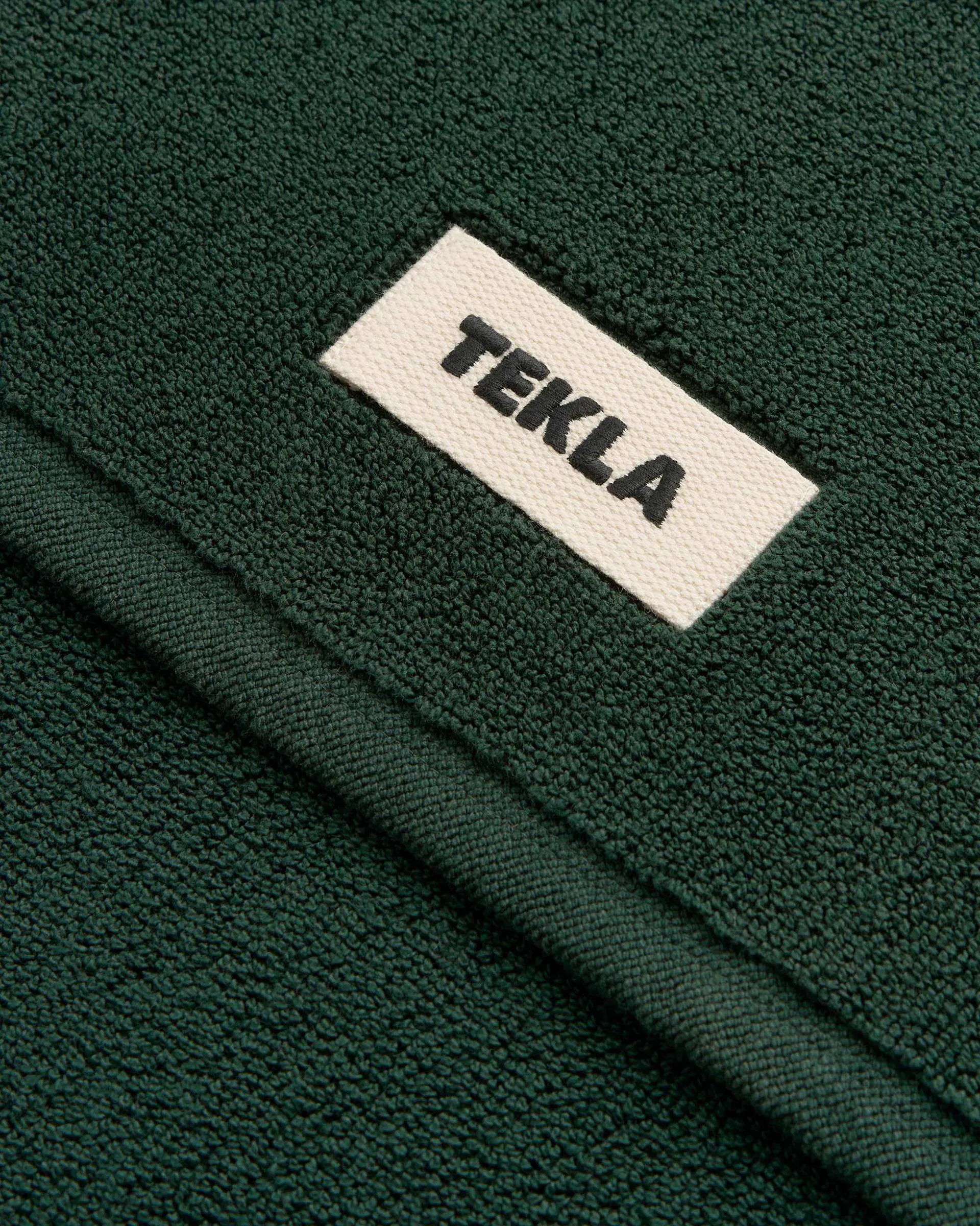 Tekla Fabrics Bath mat – solid – Forest Green